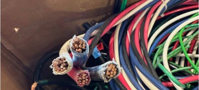 Cut ends of heavy copper cable showing bright copper strands