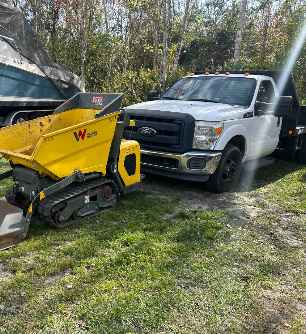 Ford work truck and tracked dumper we purchased, ready for pickup