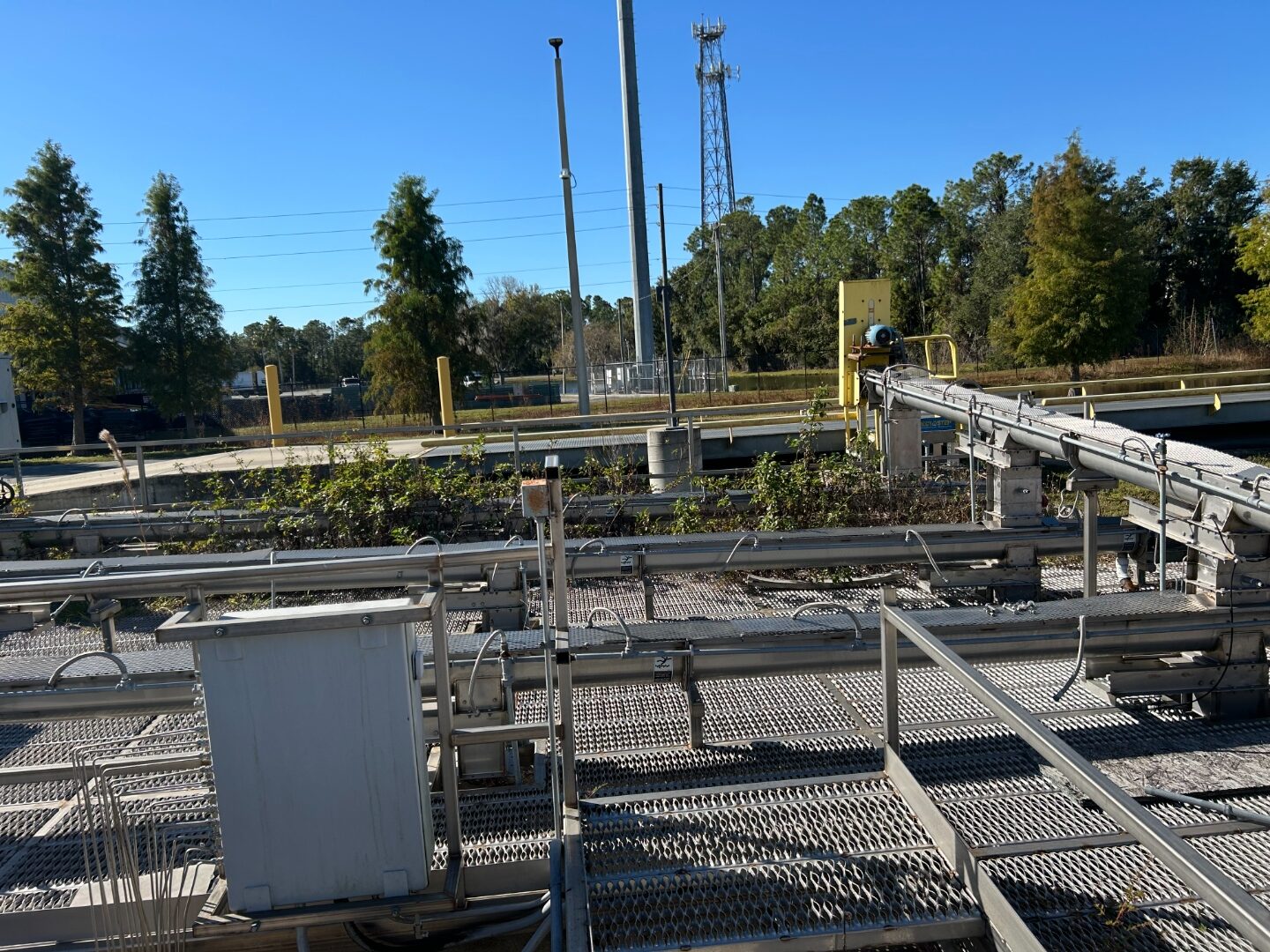 Elevated steel grating walkways at an outdoor industrial site