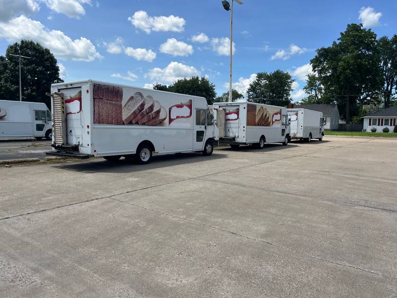 Row of step vans and cargo vans purchased in Florida
